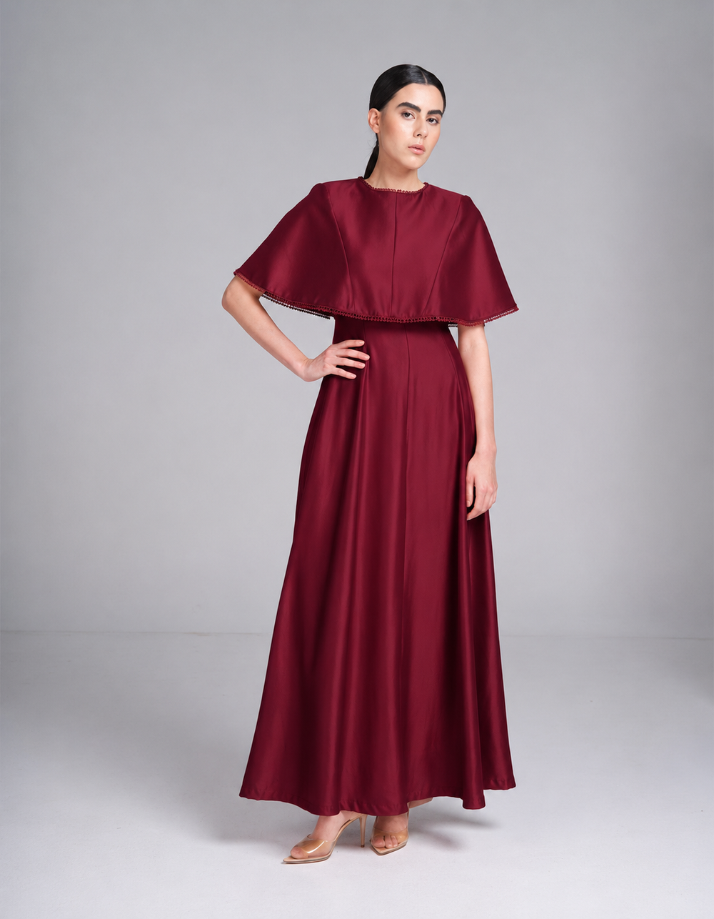 maroon metallic maxi evening gown with short cape