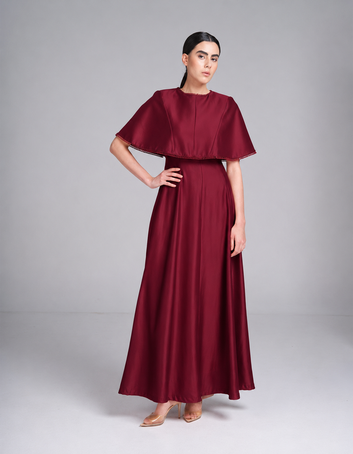 maroon metallic maxi evening gown with short cape