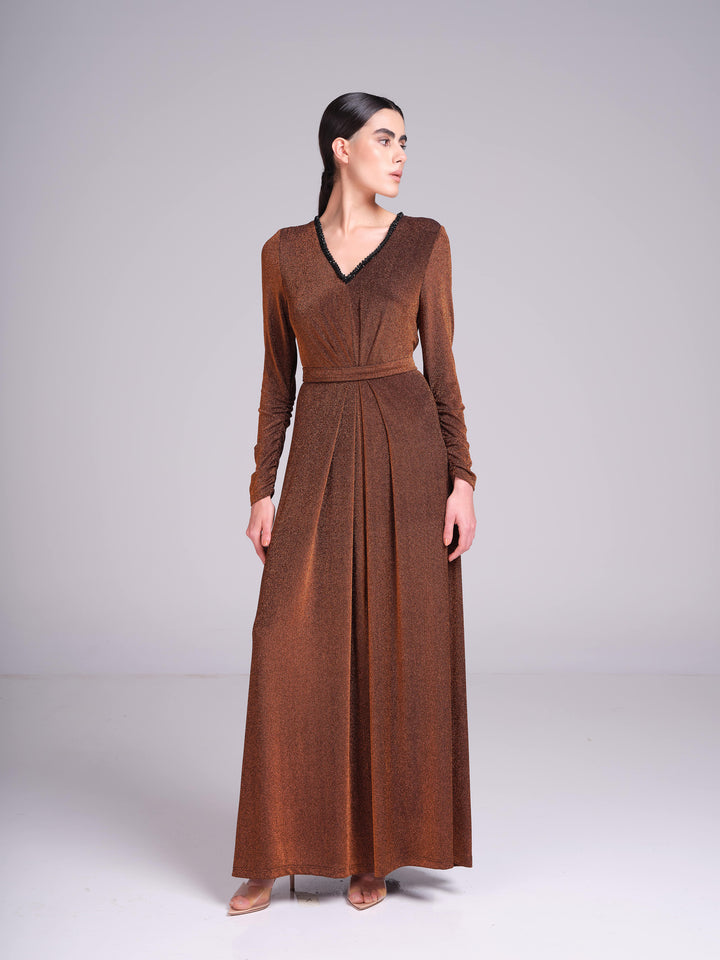 metallic long sleeve evening gown with beaded V-neckline