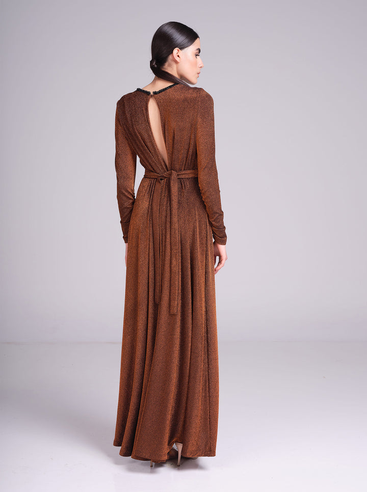 bronze metallic long sleeve evening gown with beaded V-neckline