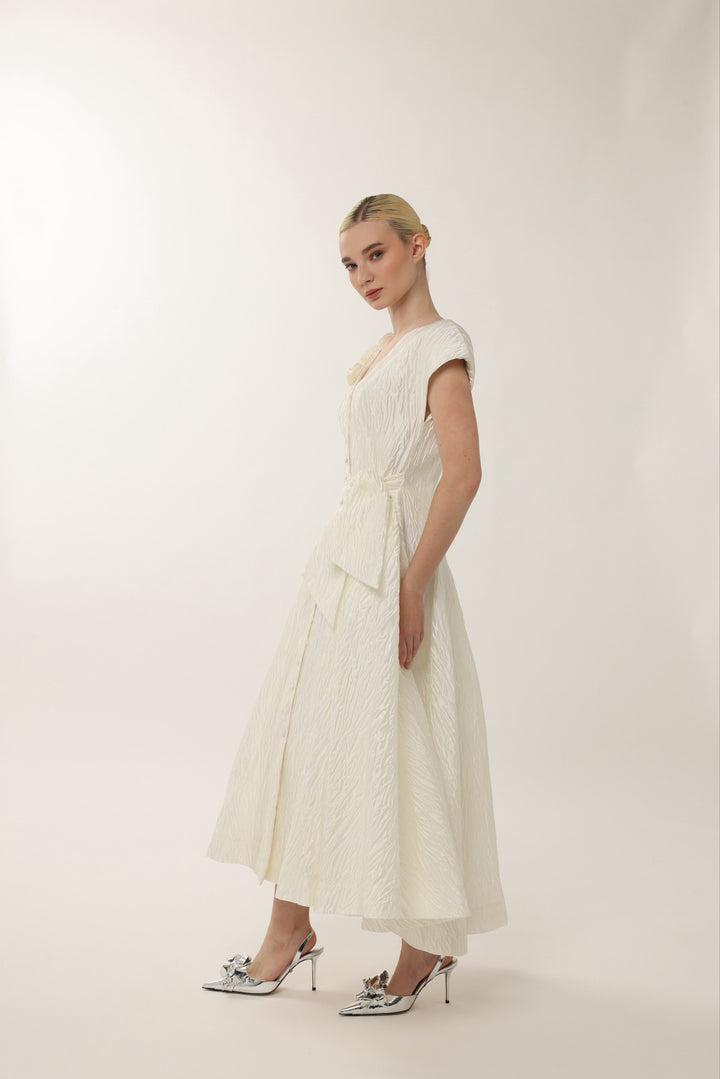 Designer ivory midi occasion dress with floral shoulder detail