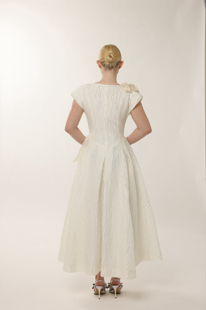 Elegant ivory wedding guest dress with side tie waist and pockets