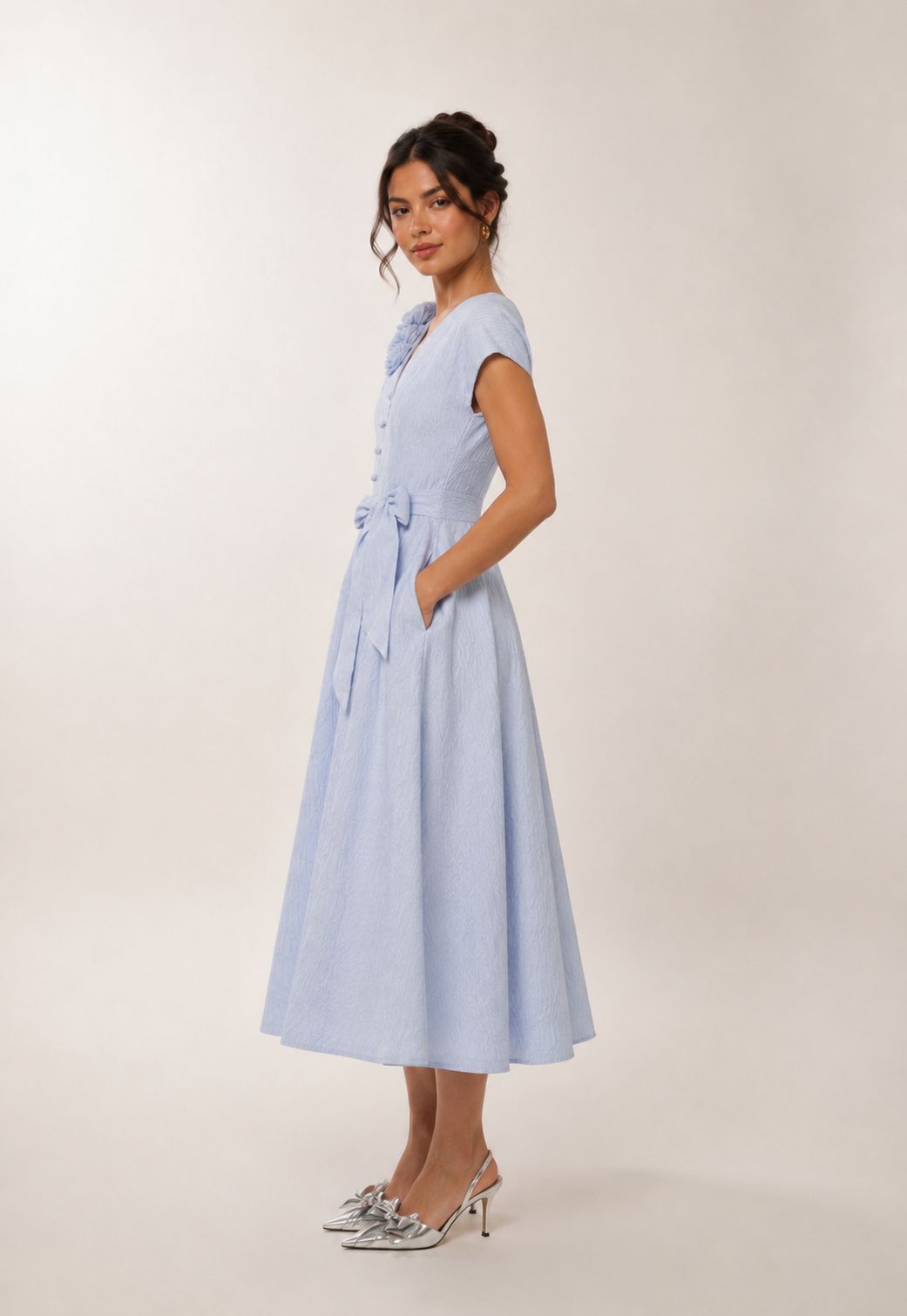 Elegant blue wedding guest dress with side tie waist and pockets