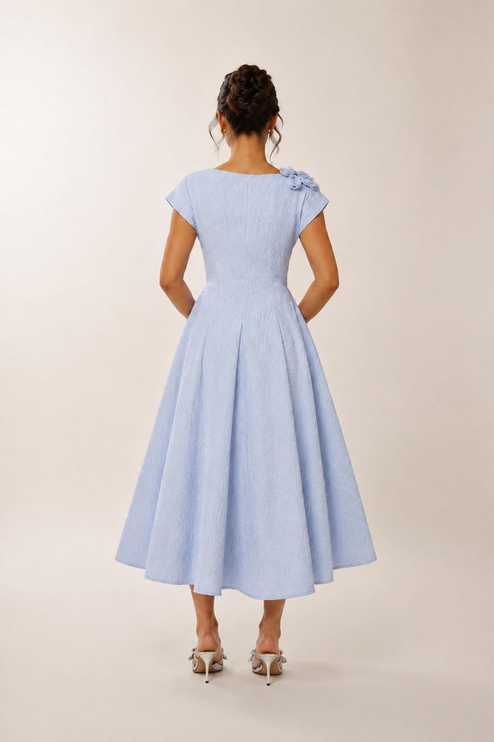 Designer blue midi occasion dress with floral shoulder detail