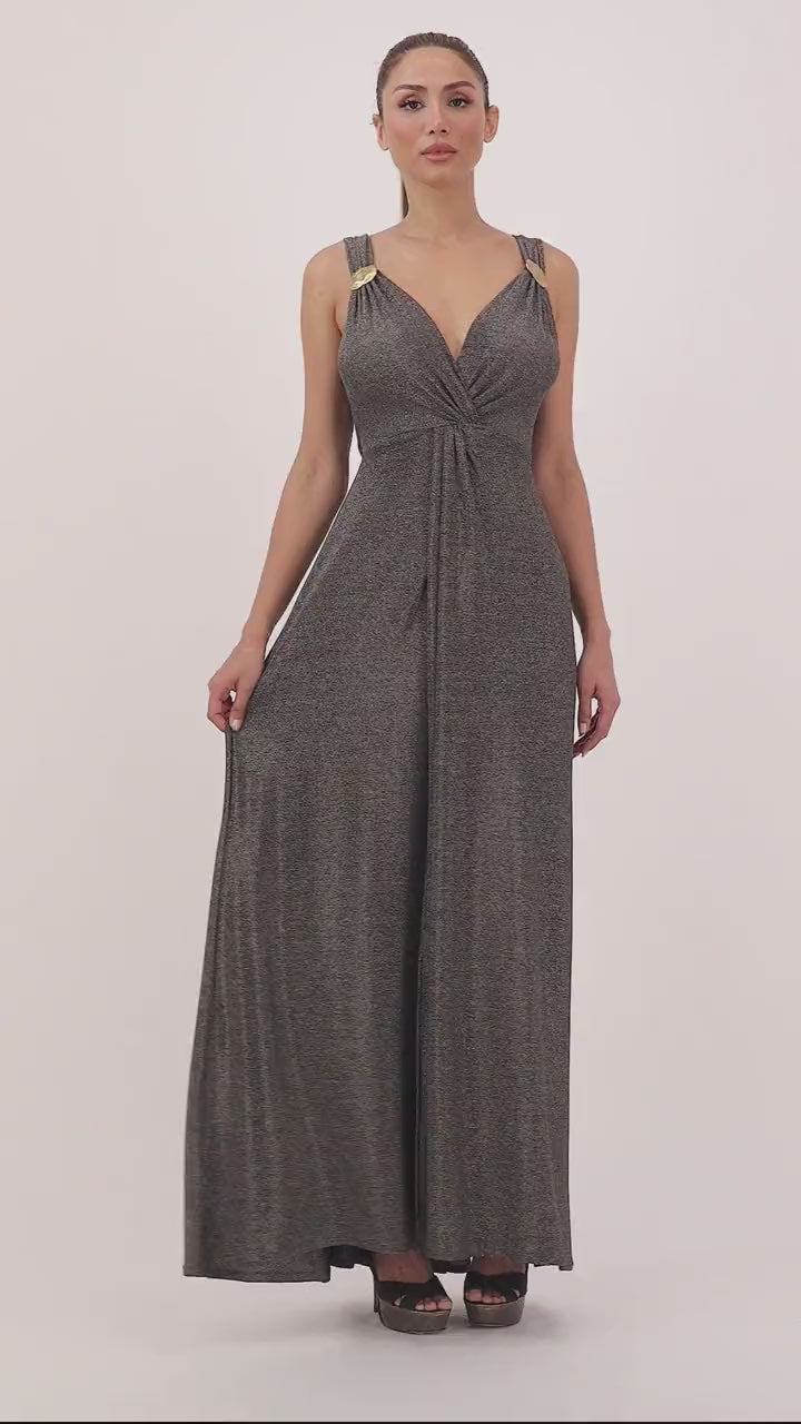 Video of the Rania Dress in gold grey, showing the front slit and the gathered bust in movement as the model walks, by Baruni