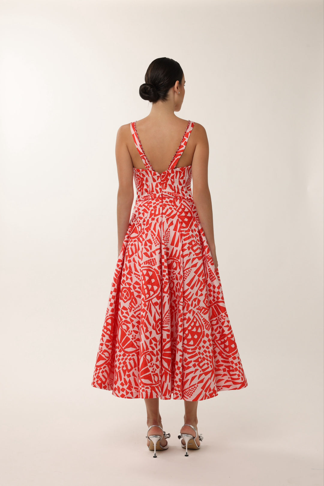 Feminine wedding guest dress in textured jacquard fabric