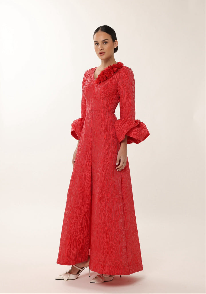 Luxury red jacquard gown with detachable floral neckline detail by Baruni