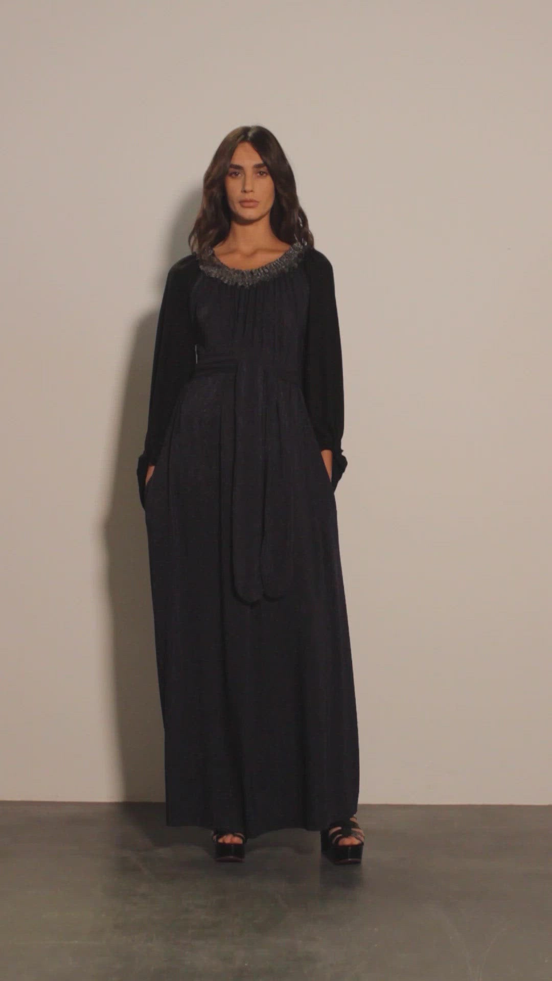 Long dress with contrasting sleeves.