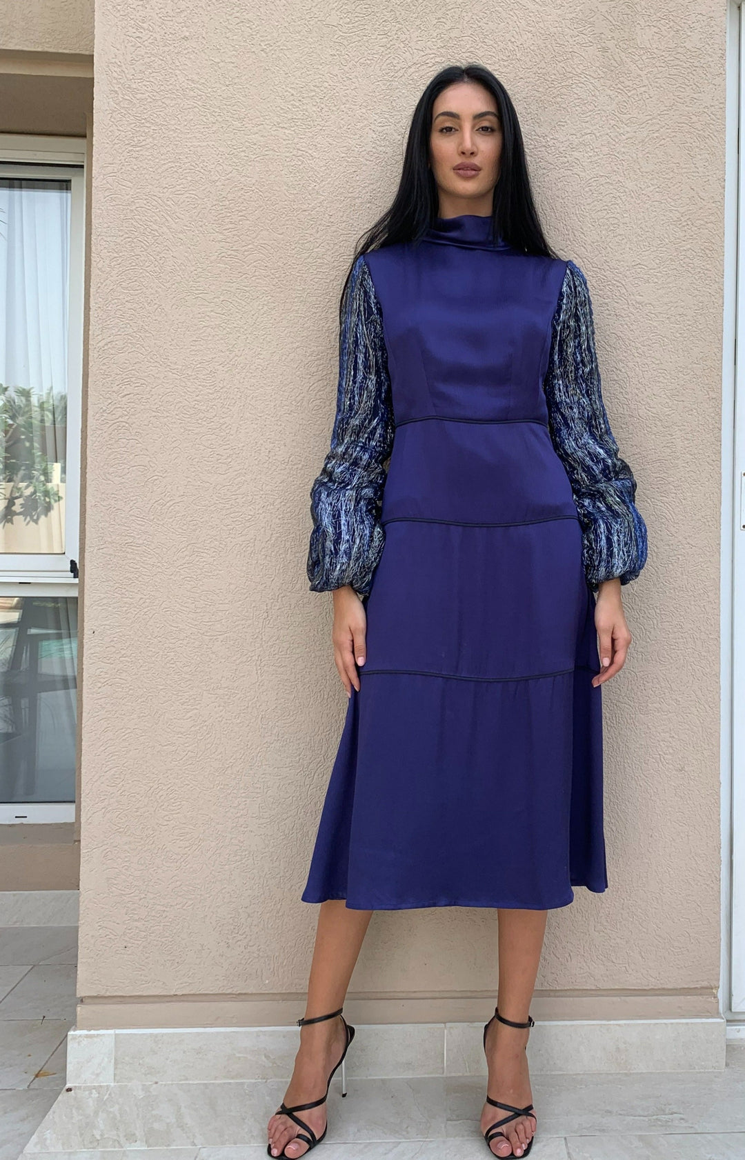 Midi dress with high collar.